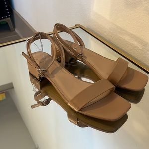 Beautiful nude, neutral, low block heel sandal with open toe and ankle strap!!